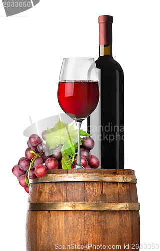 Image of Grape and wine on a barrel