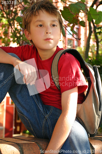 Image of Casual student waiting outside school