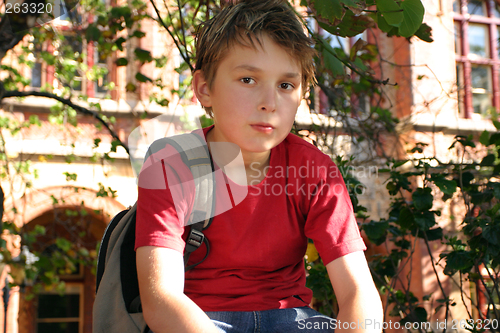 Image of Student waiting outside school