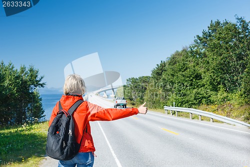 Image of Hitchhiking travel man at the route