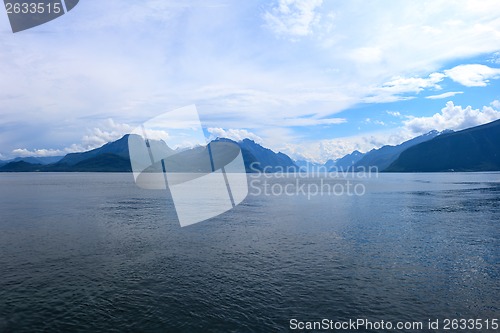 Image of Mountains and fjord in the late afternoon