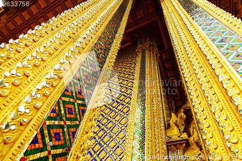 Image of Golden pillar in thai temple