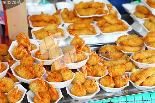 Image of Fried prawns in street market