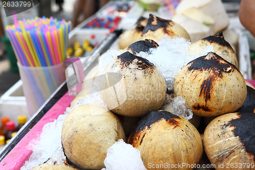 Image of Young coconut drinks on street 