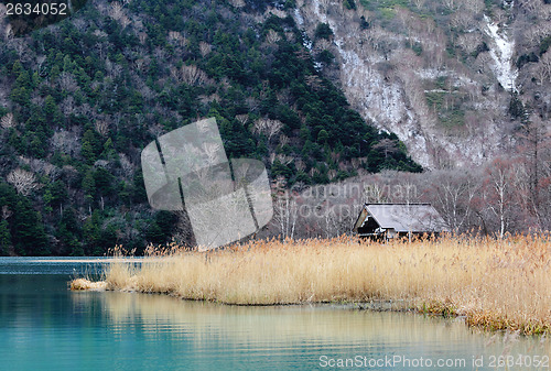 Image of Beatiful lake with wooden house