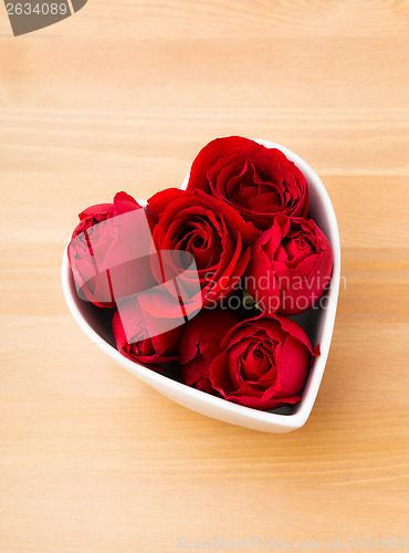 Image of Rose in heart shape bowl