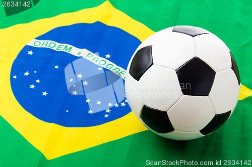 Image of Brazil flag and soccer ball