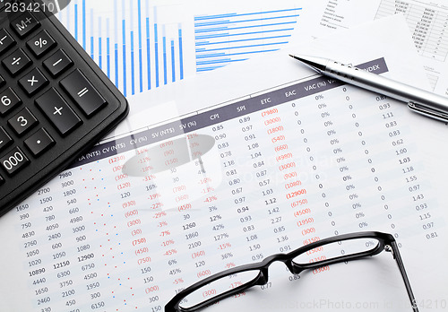 Image of Financial paper charts and graphs