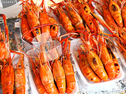 Image of Prawns grilled on a street market 