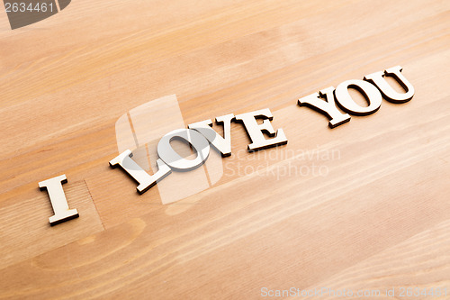 Image of Wooden letters forming with phrase I Love You 
