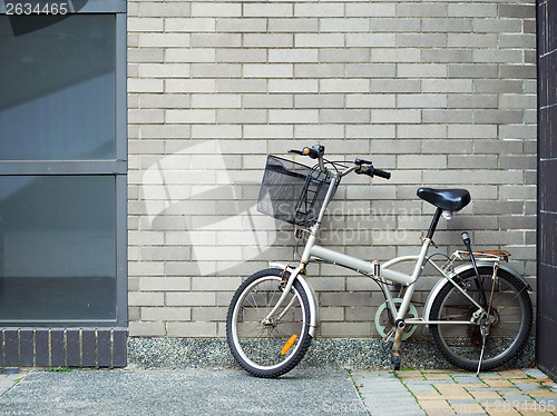 Image of Bicycle and brick wall