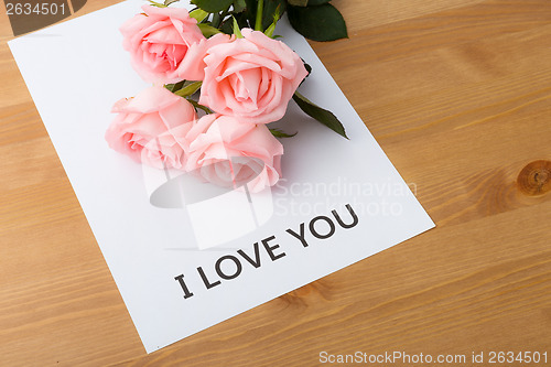 Image of Pink rose with message of I Love You