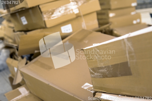 Image of Opened cardboard box in a building