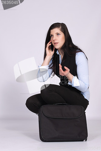 Image of Young woman calling