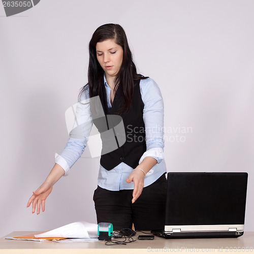 Image of Young female boss at the table