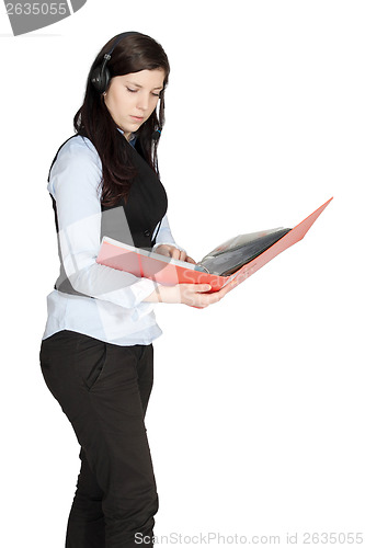 Image of Young woman with a headset and documents