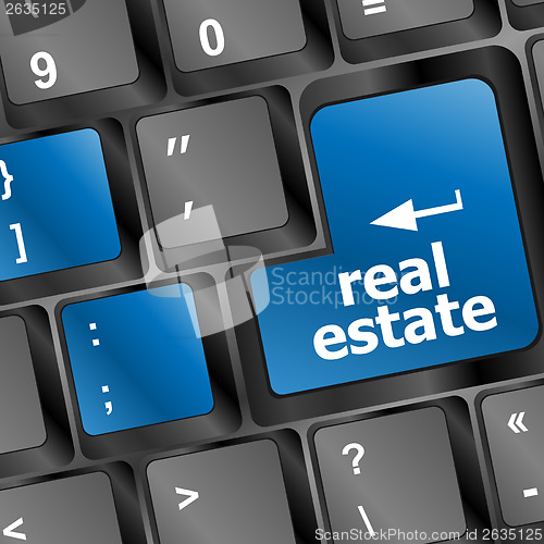 Image of real estate computer key showing internet concept