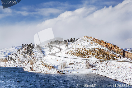 Image of mountain lake and road in winter