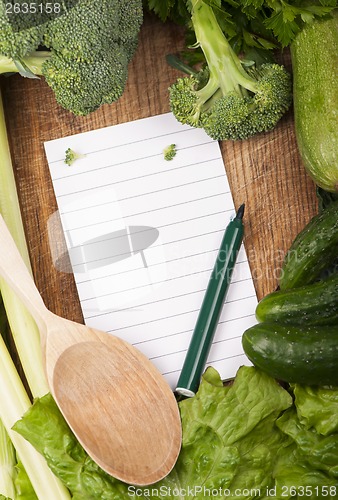 Image of vegetables on wooden background