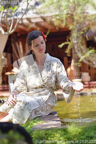 Image of spa treatment at tropical resort