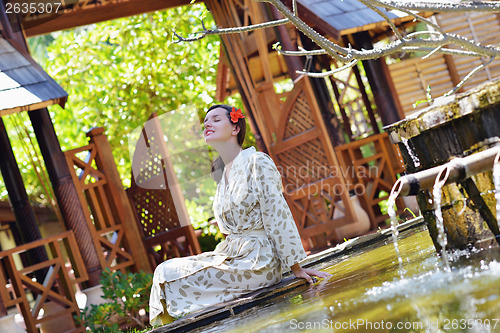 Image of spa treatment at tropical resort