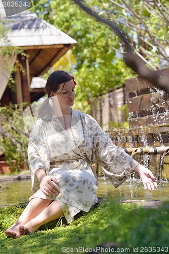 Image of spa treatment at tropical resort