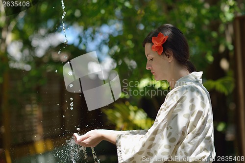 Image of spa treatment at tropical resort