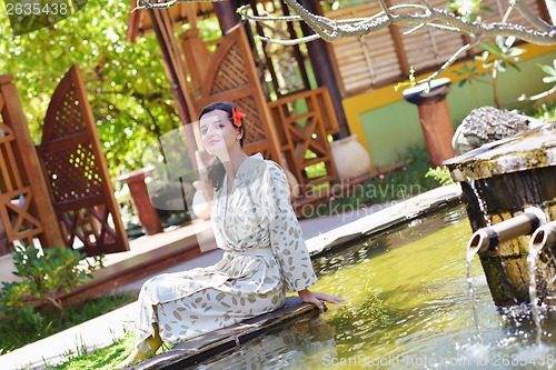 Image of spa treatment at tropical resort