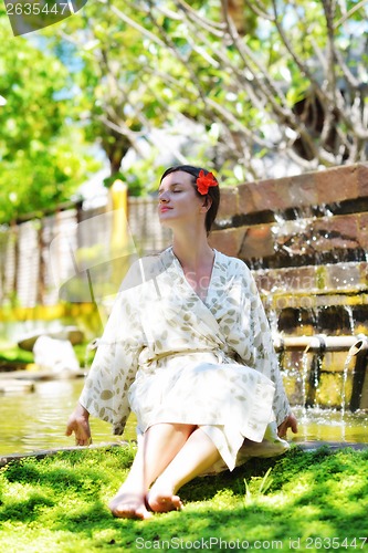 Image of spa treatment at tropical resort