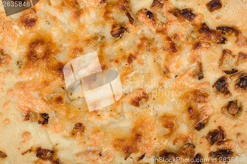 Image of texture of bread with cheese and onion 