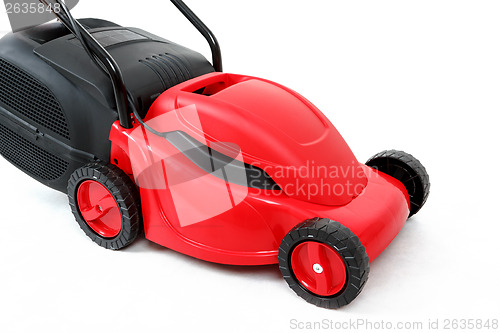 Image of new red lawnmower on white background