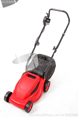 Image of new red lawnmower on white background