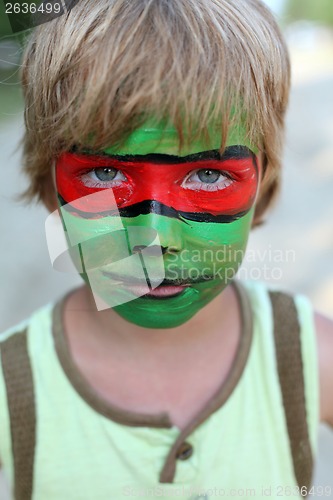 Image of boy child with a mask on her face