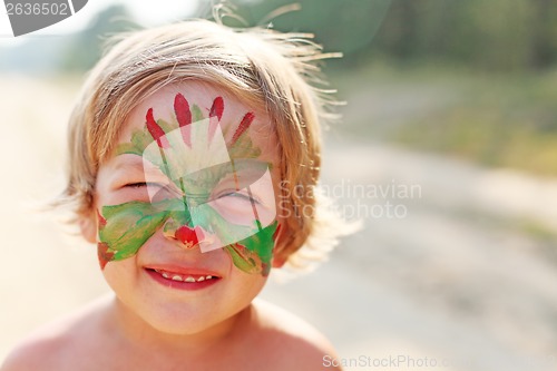 Image of boy child with a mask on her face