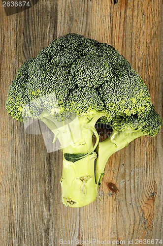 Image of fresh cabbage broccoli on a wooden board