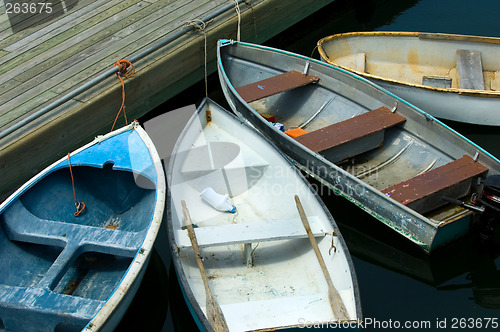 Image of Rowboats by the pier