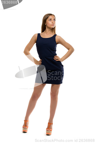 Image of slim pretty girl in a short dress