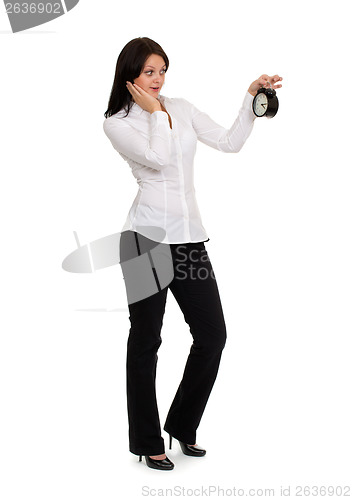 Image of Girl with surprise looks at his watch