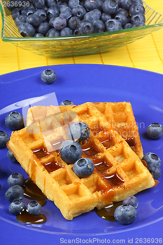 Image of Waffle with syrup and fresh blueberries