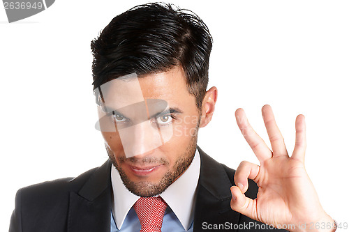 Image of Businessman making ok sign