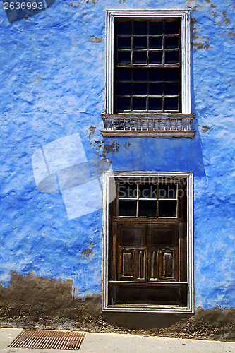Image of blue wood   couple of window in a paint wall arrecife 