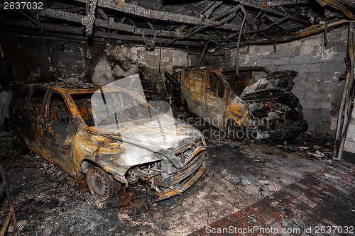 Image of Close up photo of a burned out cars