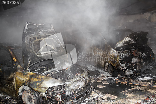 Image of Close up photo of a burned out cars