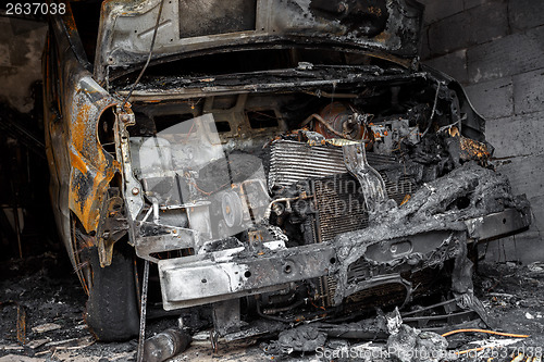 Image of Close up photo of a burned out cars