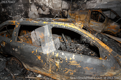 Image of Close up photo of a burned out cars