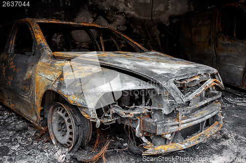 Image of Close up photo of a burned out cars