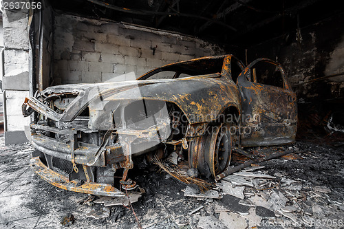 Image of Close up photo of a burned out cars