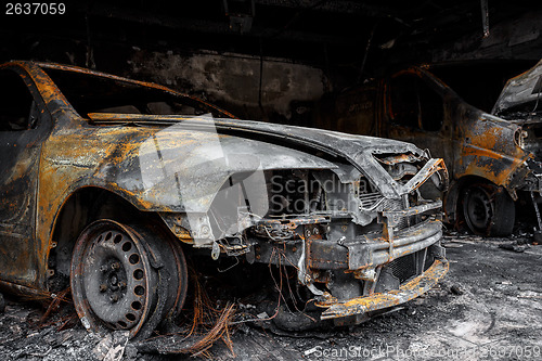 Image of Close up photo of a burned out cars