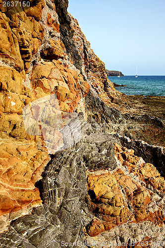 Image of rock stone sky    water    coastline and summer in lanzarote spa