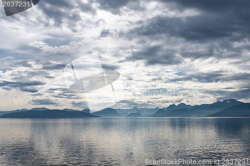 Image of Fjord scene with dramatic cloudy sky